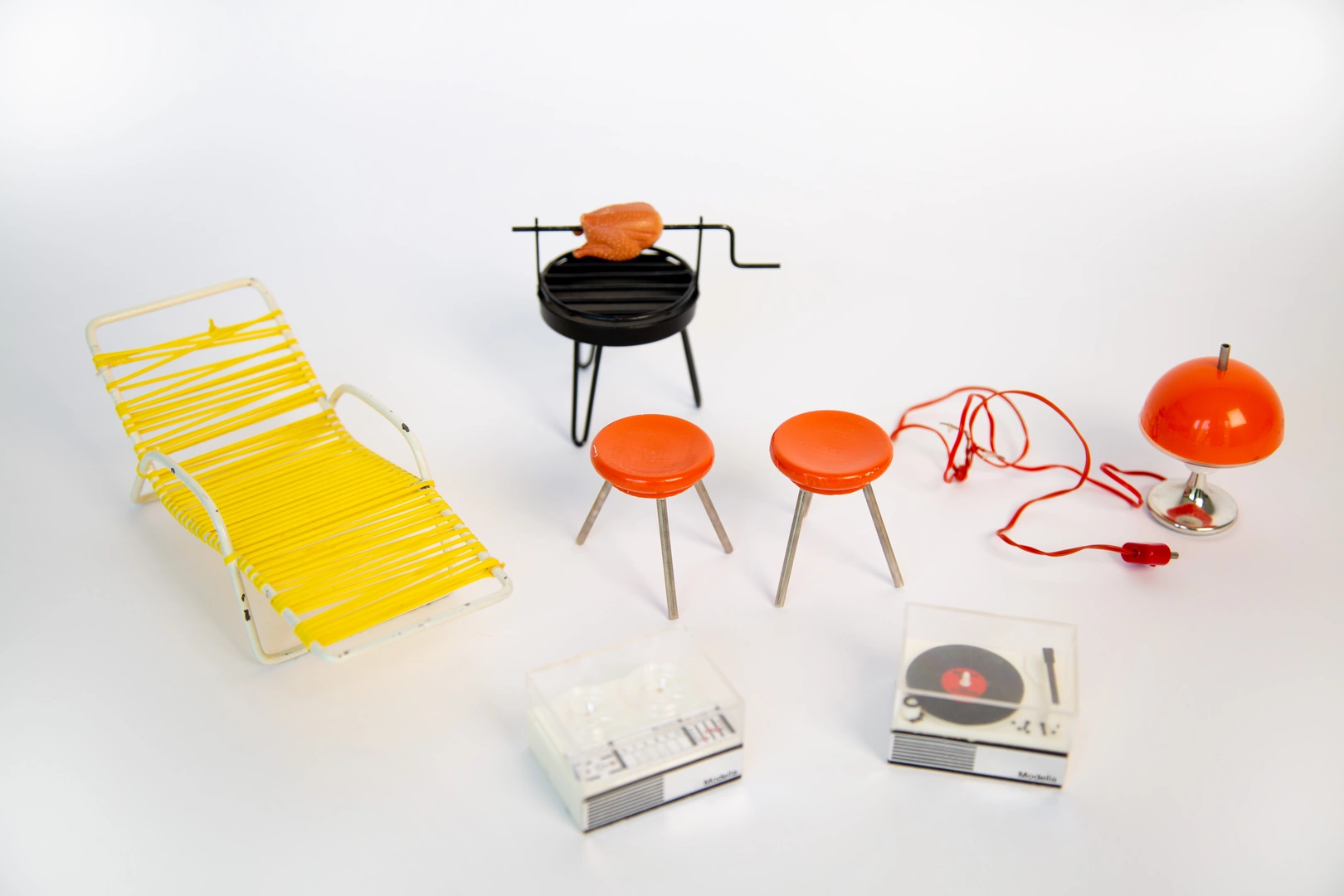 Broken doll's house furniture